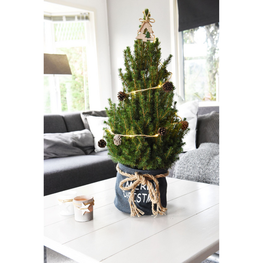 Kleine Kerstboom 70 cm in blauwe stoffen zak